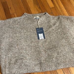 Sleeveless sweater poncho